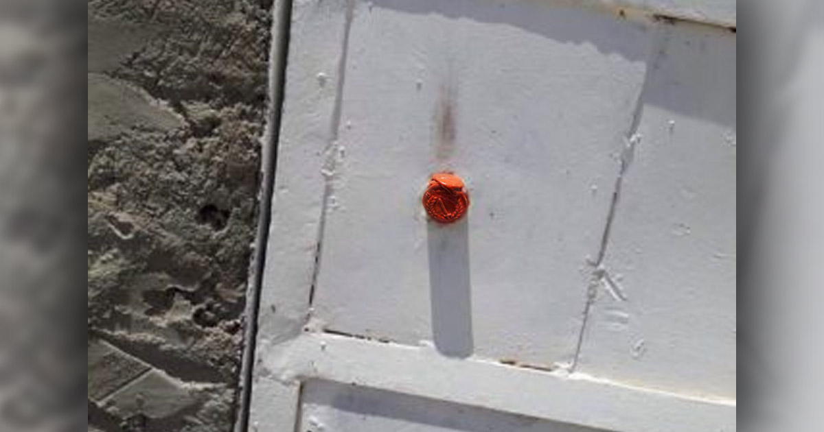 A seal on a church door. A seal on a church door.