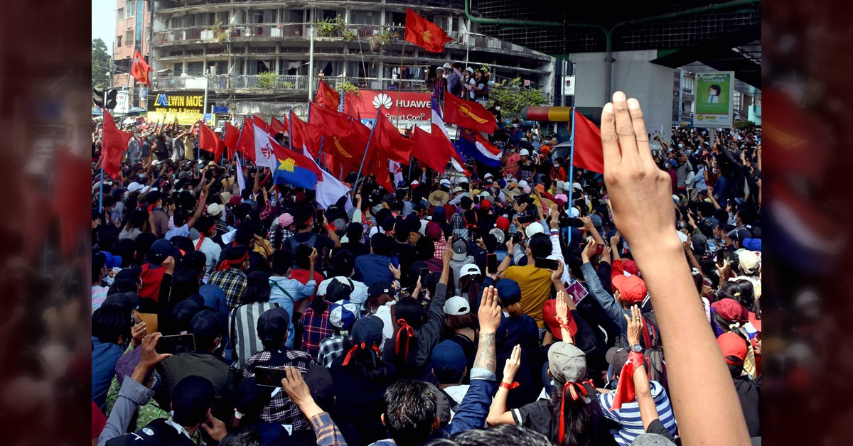 Crowd holding flags and raising the Crowd holding flags and raising the