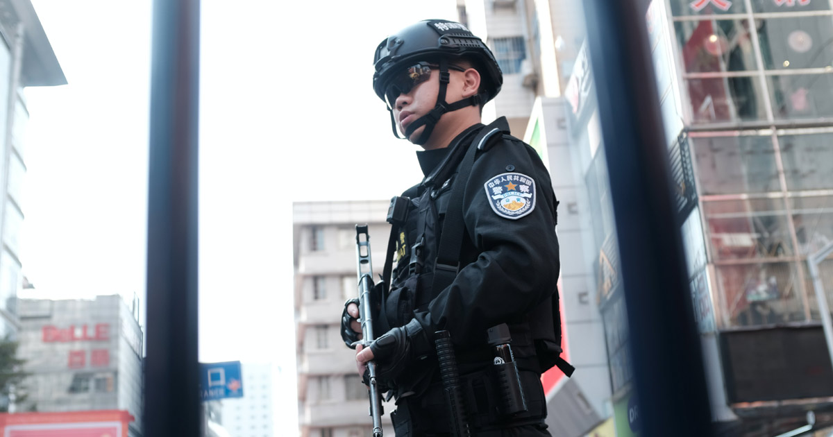 Police officer in China Police officer in China - Photo: Unsplash / Vincent Chan