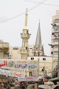 A church and a mosque next to each other. A church and a mosque next to each other - Photo: Wikipedia / TheEgyptian