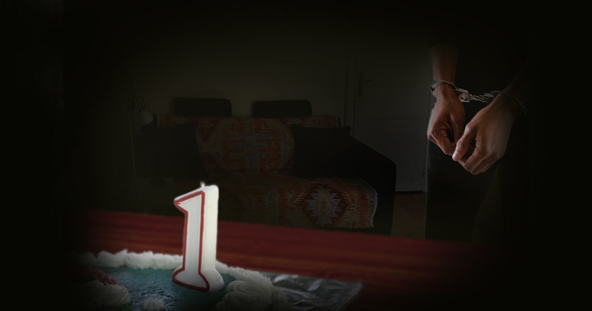A birthday cake with a candle in the shape of the numeral 