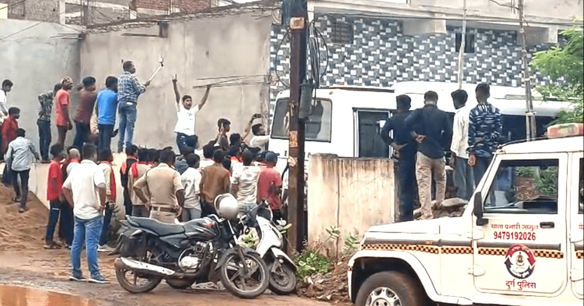 A crowd is gathered around a church building.