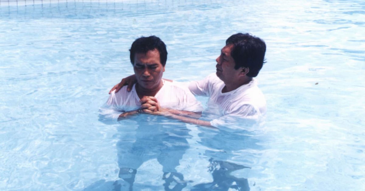 A believer is being baptized.