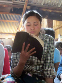 A Laotian believer reading her Bible. A Laotian believer reading her Bible - Photo: VOM USA www.icommittopray.com