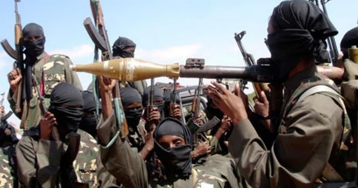 Masked Boko Haram fighters are holding various types of weaponry.