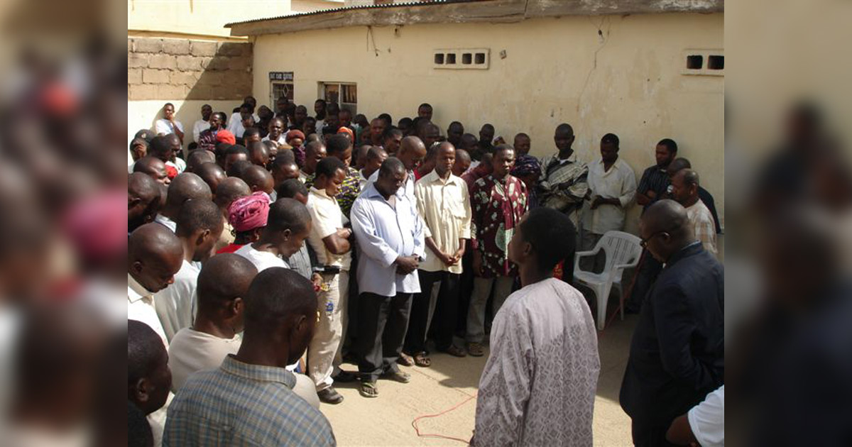 Believers gathered together in prayer. Believers gathered together in prayer.