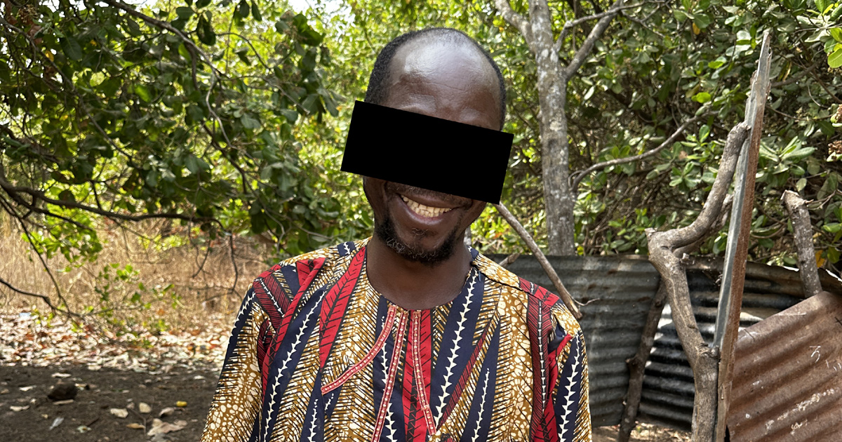 Pastor Kokouvi. His face is obscured. Pastor Kokouvi. His face is obscured.