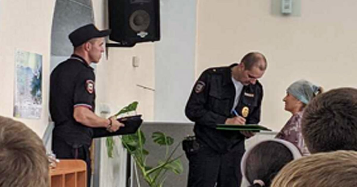 Police are asking church members questions and taking notes.