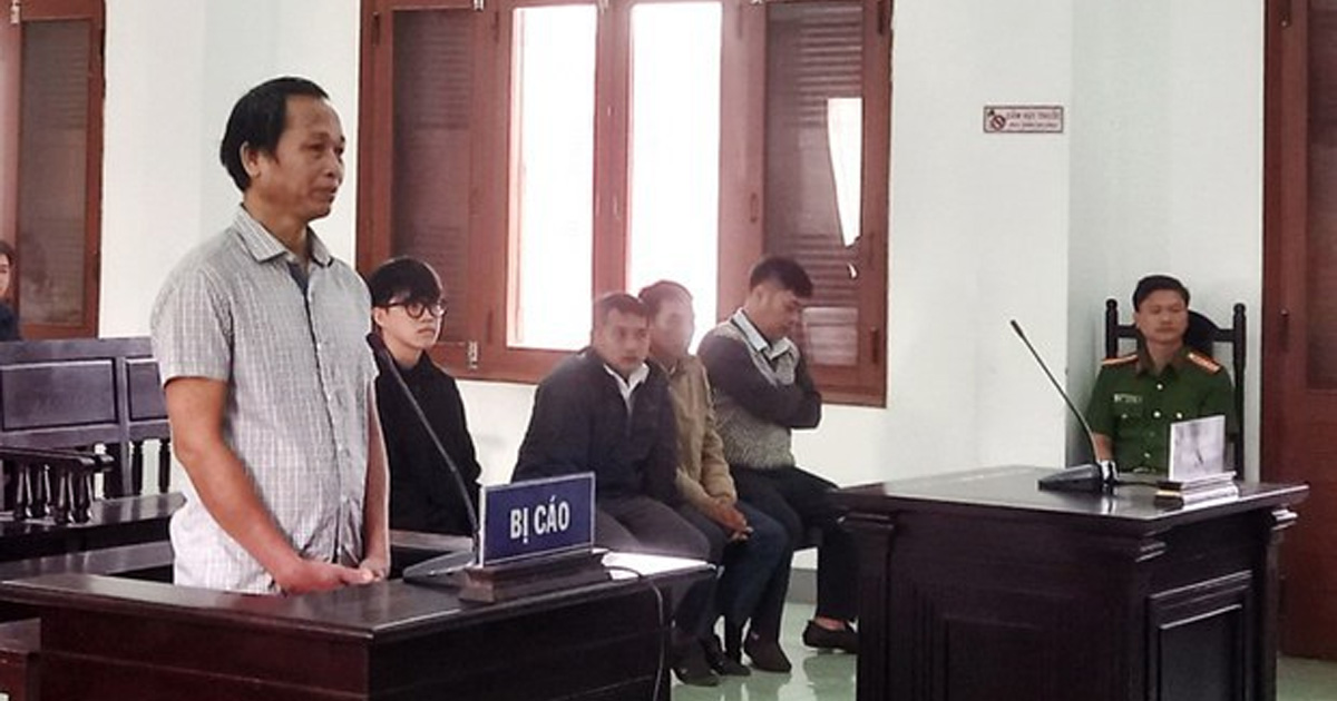 Nay Y Blang is standing in court. Nay Y Blang is standing in court.