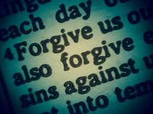 Close-up image of a portion of the Lord's Prayer - ''Forgive us... also forgive... sins against...'' Close-up image of a portion of the Lord's Prayer - ''Forgive us... also forgive... sins against...''