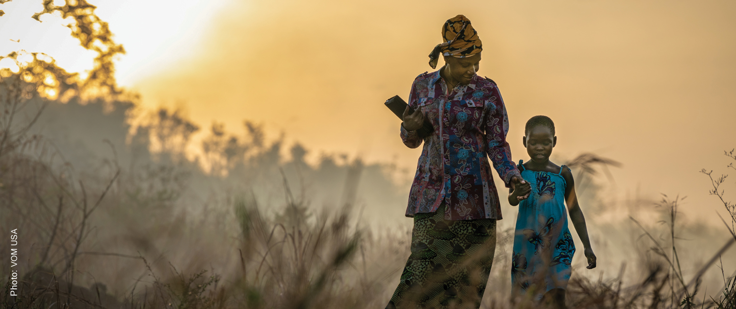 A woman and a child walking together