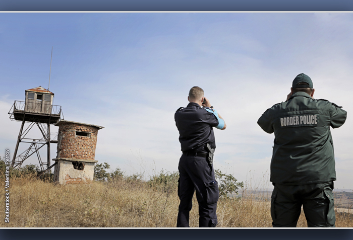 Border police surveying the landscape