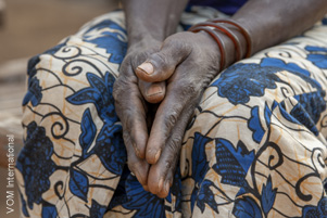 A woman's praying hands